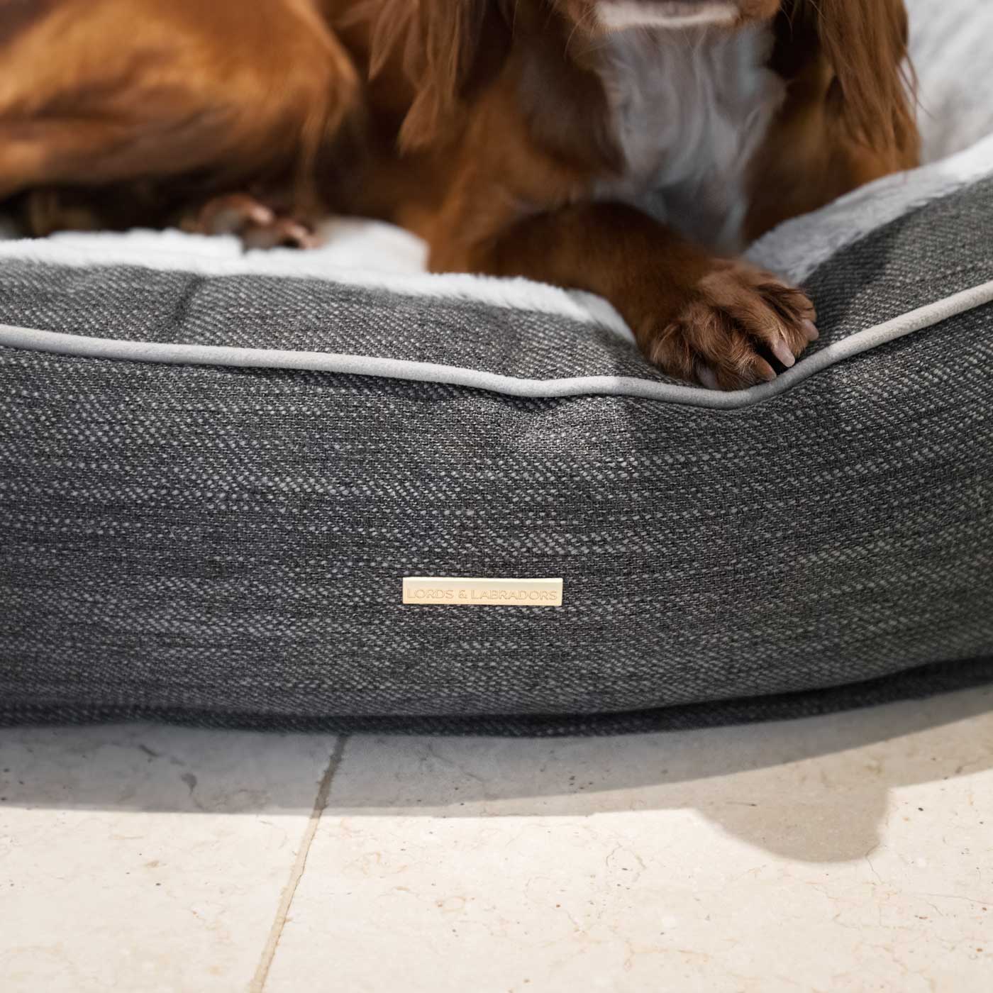 Discover Our Luxurious “The Nest” Dog Bed, Crafted Using Soft, Plush Fabric For Extra Comfort! Bringing Your Canine Companion The Perfect Bed For Dogs To Curl Up To! Available Now at Lords & Labradors