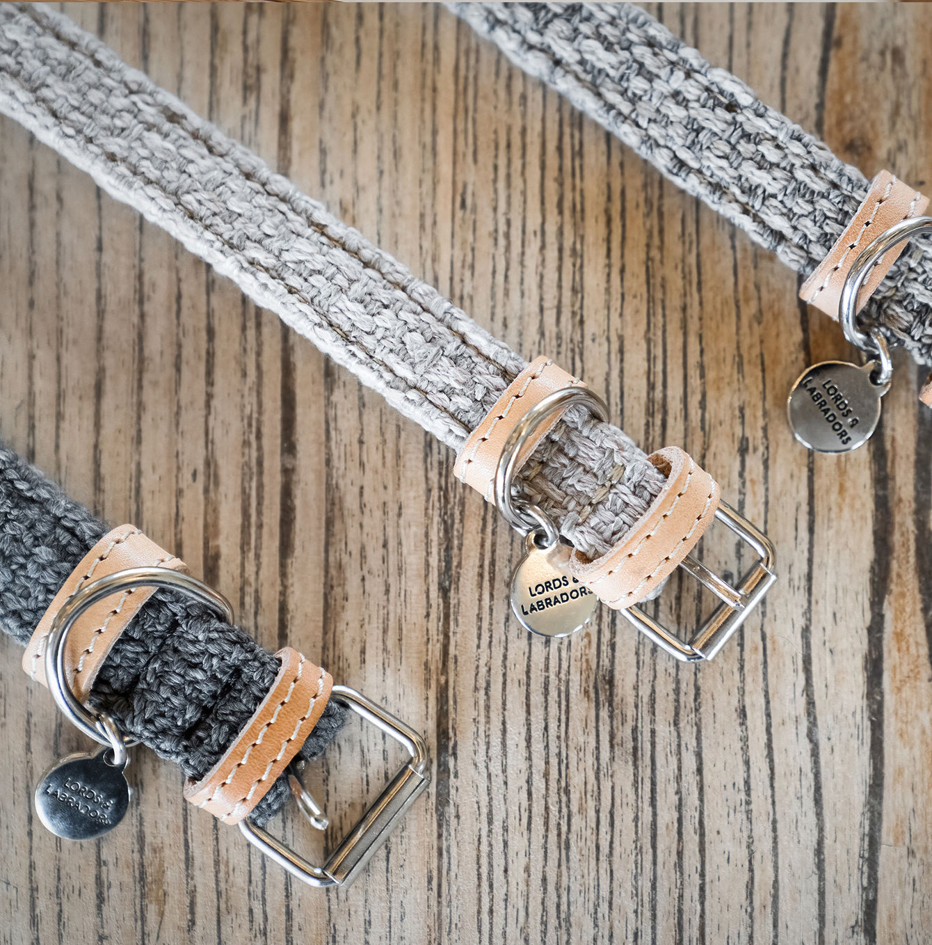 Discover dog walking luxury with our handcrafted Italian dog collar in beautiful graphite with woven dark grey fabric! The perfect collar for dogs available now at Lords & Labradors