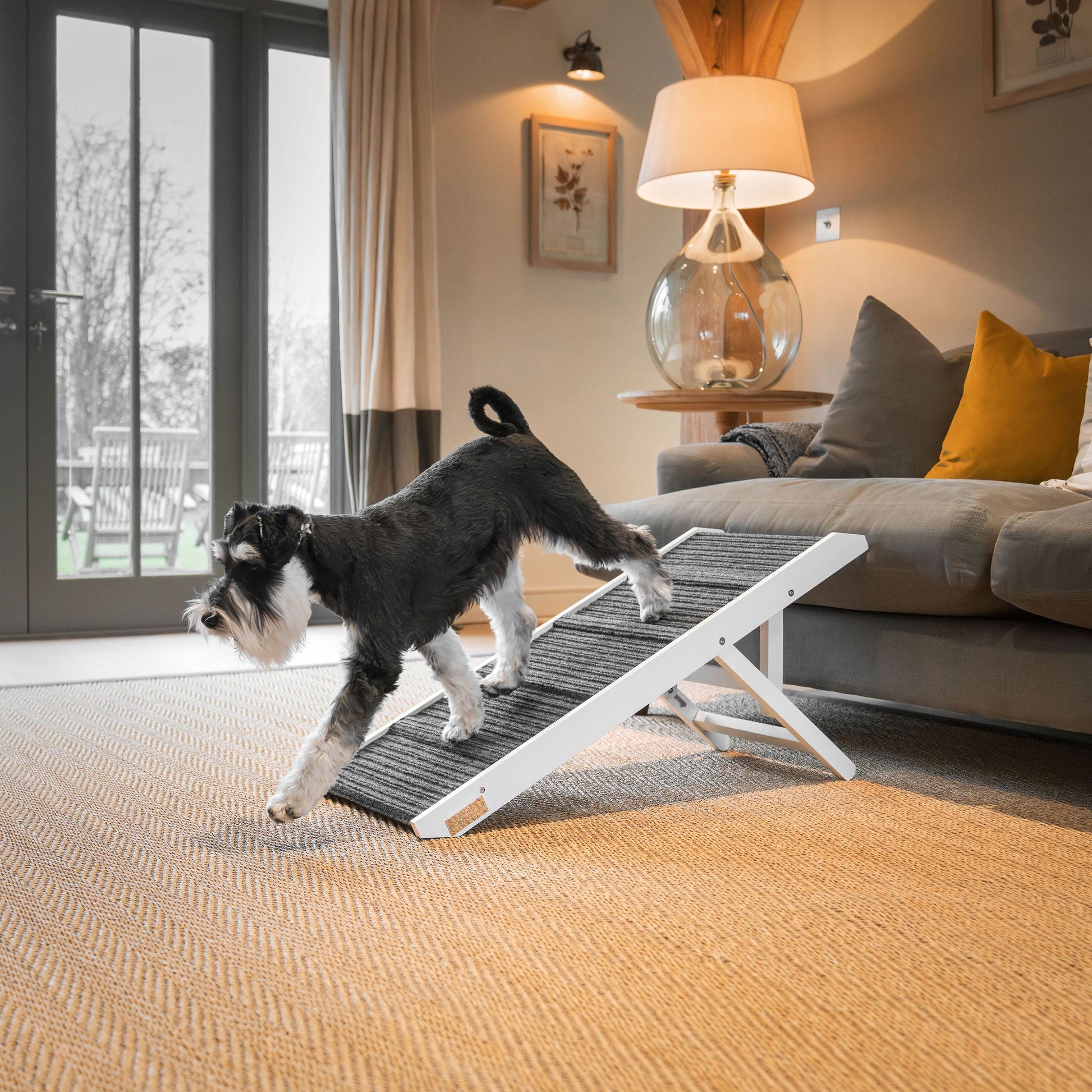 Discover the perfect pet furniture to help aid your furry friend, our super-strong dog ramp provides the ultimate comfort when climbing to join you on the couch! Featuring grooves for extra grip! Perfect for injured pets, puppy training and elderly dogs! Available now in 2 stylish colours at Lords & Labradors     