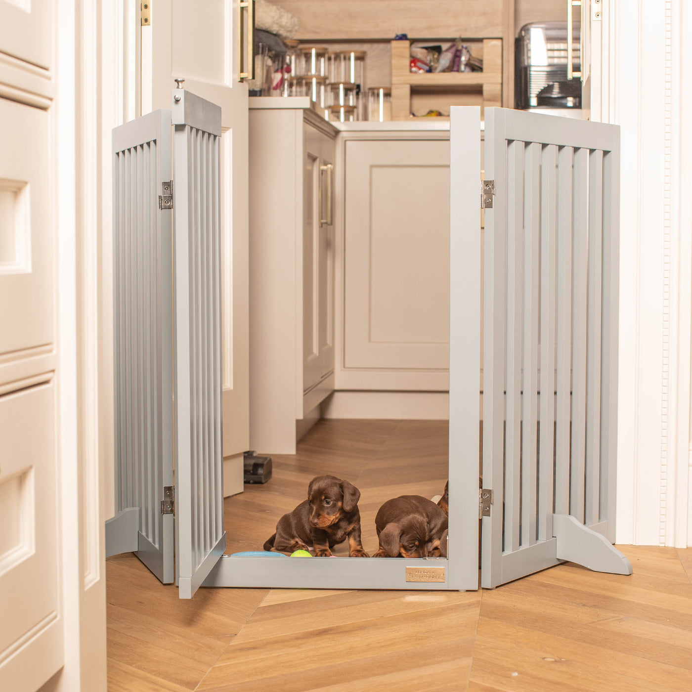 Train your new puppy with the perfect pet furniture, our super-strong wooden dog gate will ensure you set the boundaries for your furry friend, made easy to assemble featuring a walk-through gate for easy accessibility to be installed in doorways, hallways and stairs! Shop the ideal pet gate, available now in white & grey at Lords & Labradors     