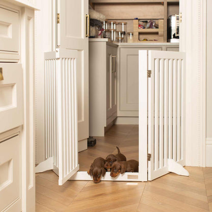 Train your new puppy with the perfect pet furniture, our super-strong wooden dog gate will ensure you set the boundaries for your furry friend, made easy to assemble featuring a walk-through gate for easy accessibility to be installed in doorways, hallways and stairs! Shop the ideal pet gate, available now in white & grey at Lords & Labradors     