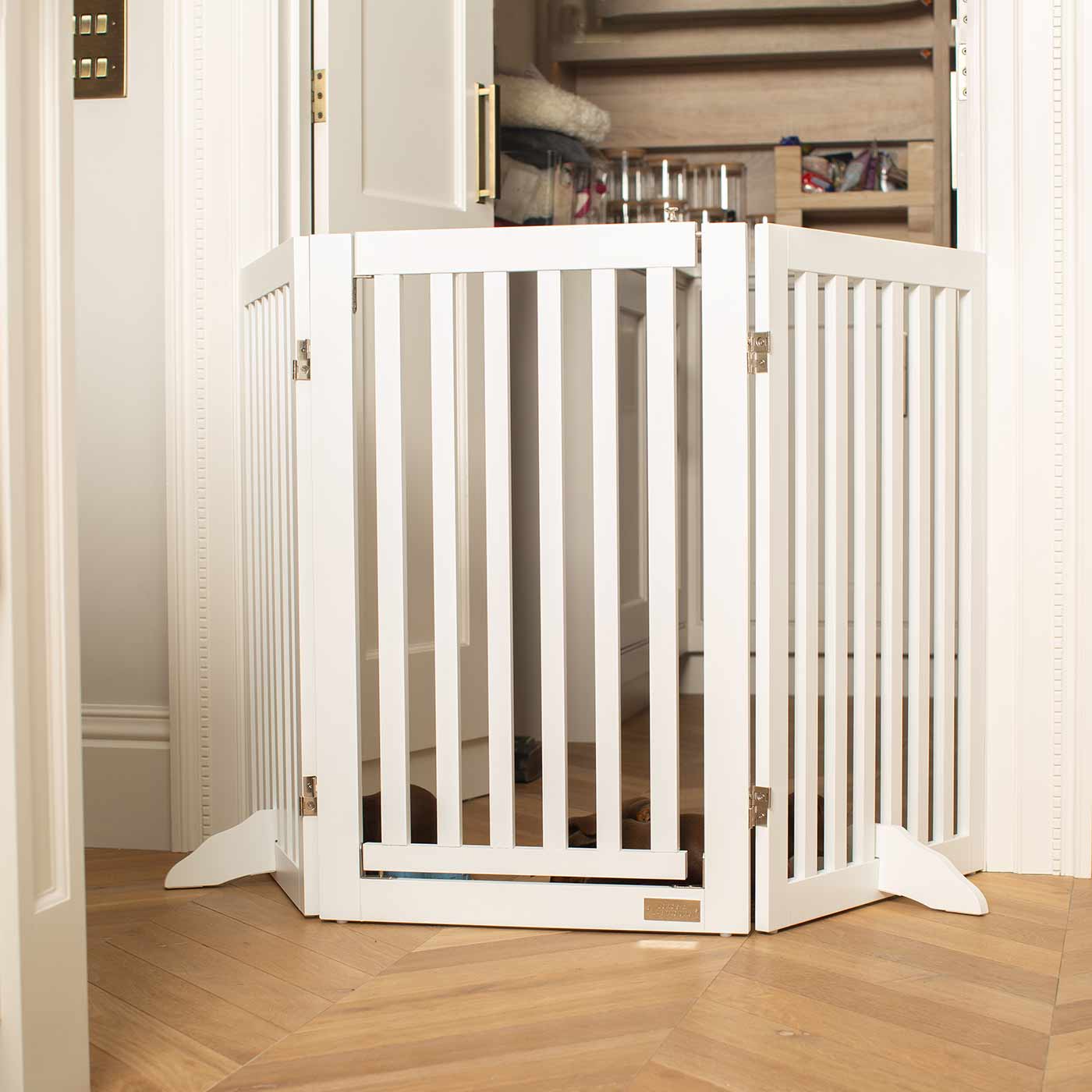 Train your new puppy with the perfect pet furniture, our super-strong wooden dog gate will ensure you set the boundaries for your furry friend, made easy to assemble featuring a walk-through gate for easy accessibility to be installed in doorways, hallways and stairs! Shop the ideal pet gate, available now in white & grey at Lords & Labradors     