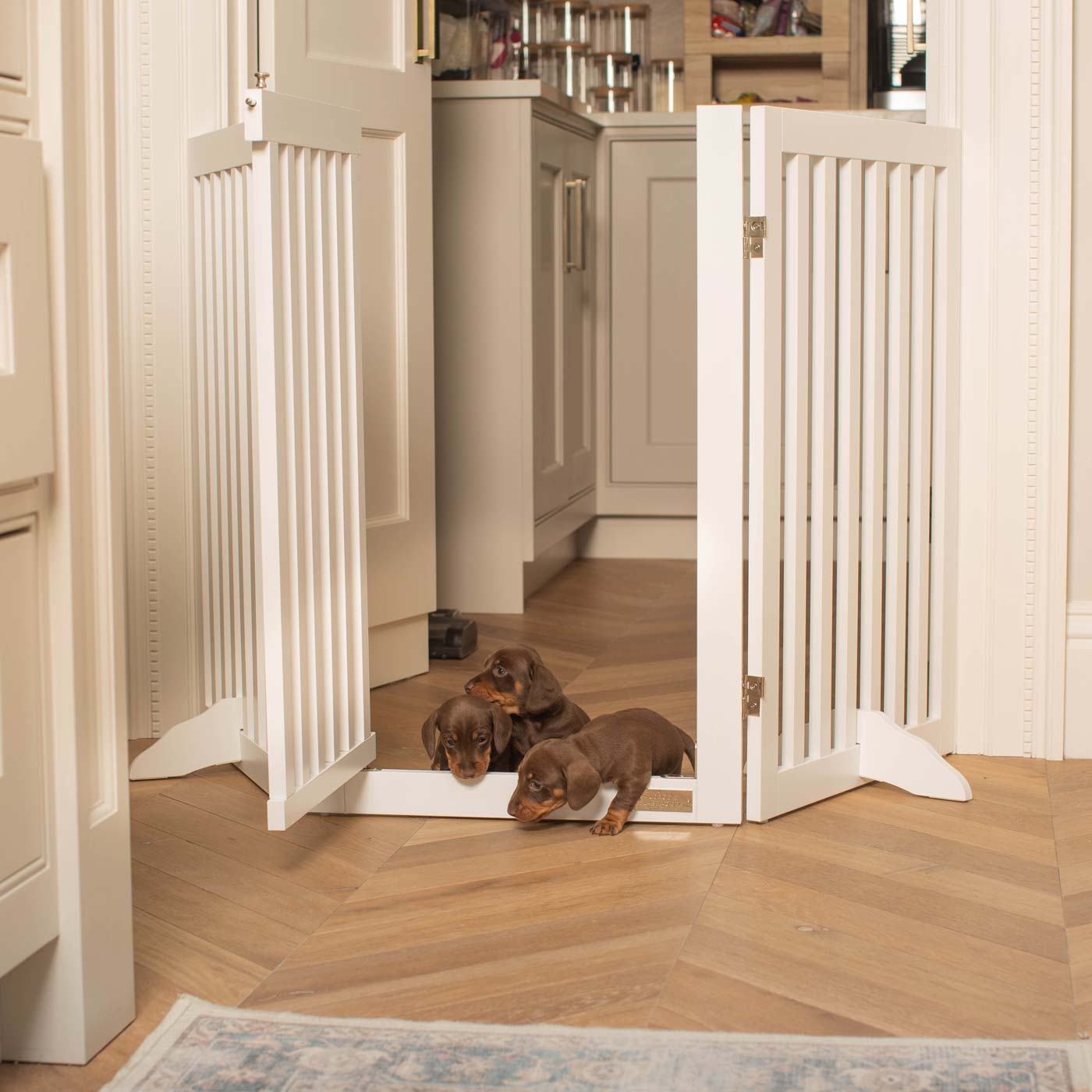 Train your new puppy with the perfect pet furniture, our super-strong wooden dog gate will ensure you set the boundaries for your furry friend, made easy to assemble featuring a walk-through gate for easy accessibility to be installed in doorways, hallways and stairs! Shop the ideal pet gate, available now in white & grey at Lords & Labradors     