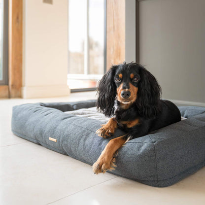 Discover Our Luxurious Comfort Cube Dog Bed in Anthracite (Navy), featuring Removable covers for easy machine washing and a non slip wipeable base. This super soft pet bed offers the ultimate comfort to your furry friend! Bringing Your Canine Companion The Perfect Bed For Dogs To Curl Up To! Available Now at Lords & Labradors