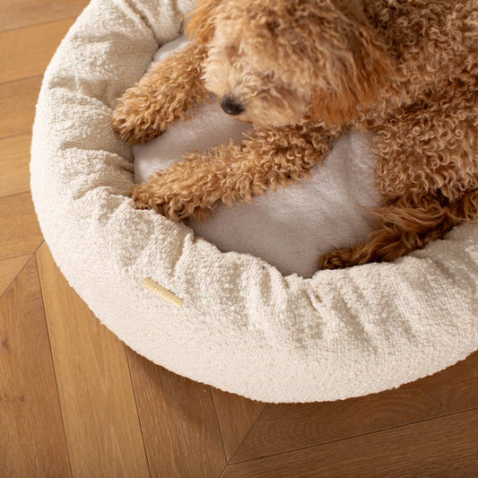 Discover Our Handmade Luxury Donut Dog Bed, In  Ivory Bouclé, The Perfect Choice For Puppies Available Now at Lords & Labradors