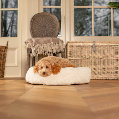 Discover Our Handmade Luxury Donut Dog Bed, In  Ivory Bouclé, The Perfect Choice For Puppies Available Now at Lords & Labradors