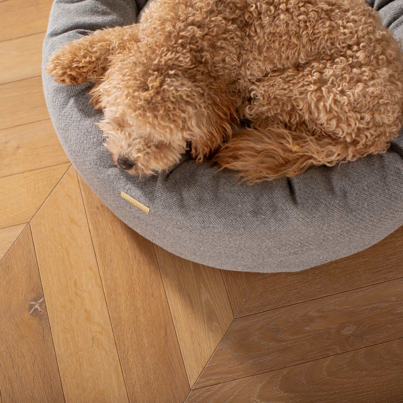 Discover Our Handmade Luxury Donut Dog Bed, In Pewter Herringbone Tweed, The Perfect Choice For Puppies Available Now at Lords & Labradors 