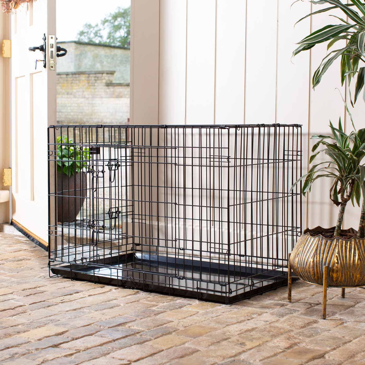 Discover the perfect deluxe heavy duty black dog crate, featuring two doors for easy access and a removable tray for easy cleaning! The ideal choice to keep new puppies safe, made using pet safe galvanised steel! Available now in 5 sizes and three stunning colours at Lords & Labradors 