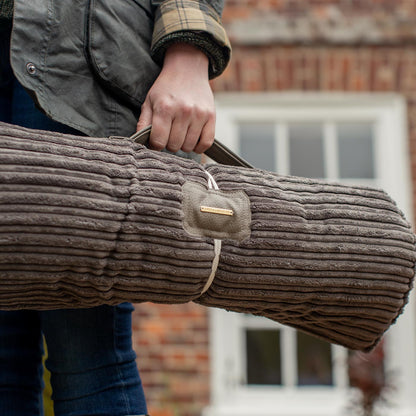 Embark on the perfect pet travel with our luxury Travel Mat in Essentials Dark Grey. Featuring a Carry handle for on the move once Rolled up for easy storage, can be used as a seat cover, boot mat or travel bed! Available now at Lords & Labradors