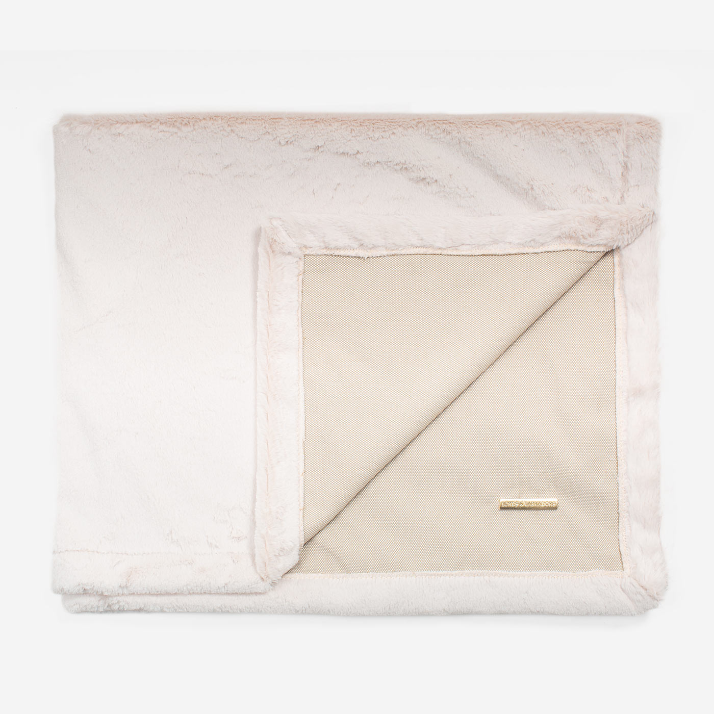 Present your furry friend with our luxuriously thick, plush blanket for your pet. Featuring a reverse side with hardwearing woven fabric handmade in Italy for the perfect high-quality pet blanket! Essentials Twill Blanket In Linen, Available now at Lords & Labradors    