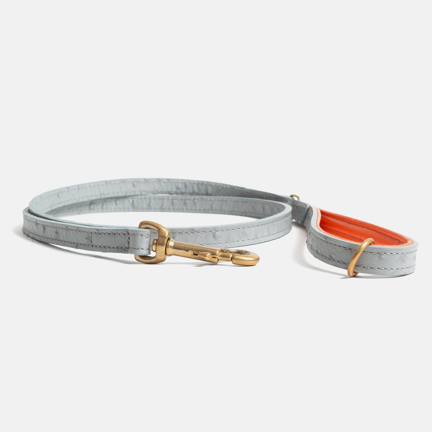 Discover dog walking luxury with our handcrafted Italian Ostrich leather dog Lead in Grey & Orange! The perfect Lead for dogs available now at Lords & Labradors