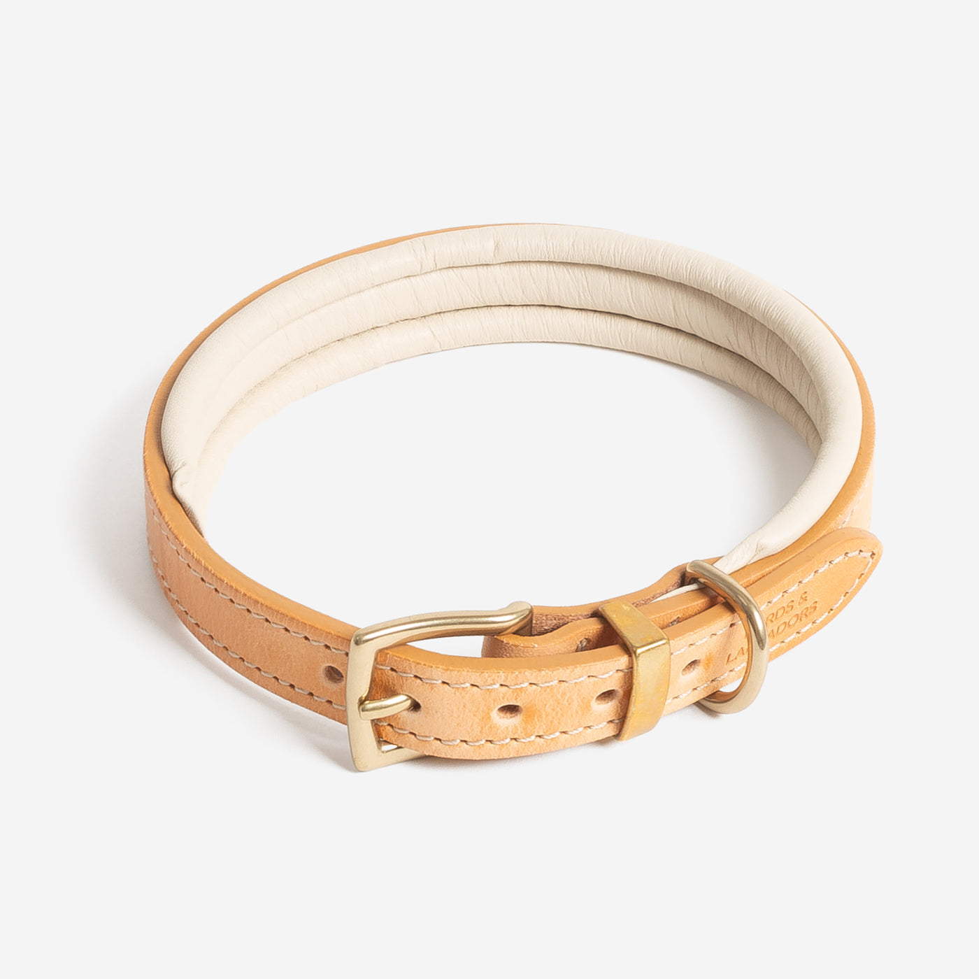 Discover dog walking luxury with our handcrafted Italian padded leather dog collar in Tan & Cream! The perfect collar for dogs available now at Lords & Labradors 