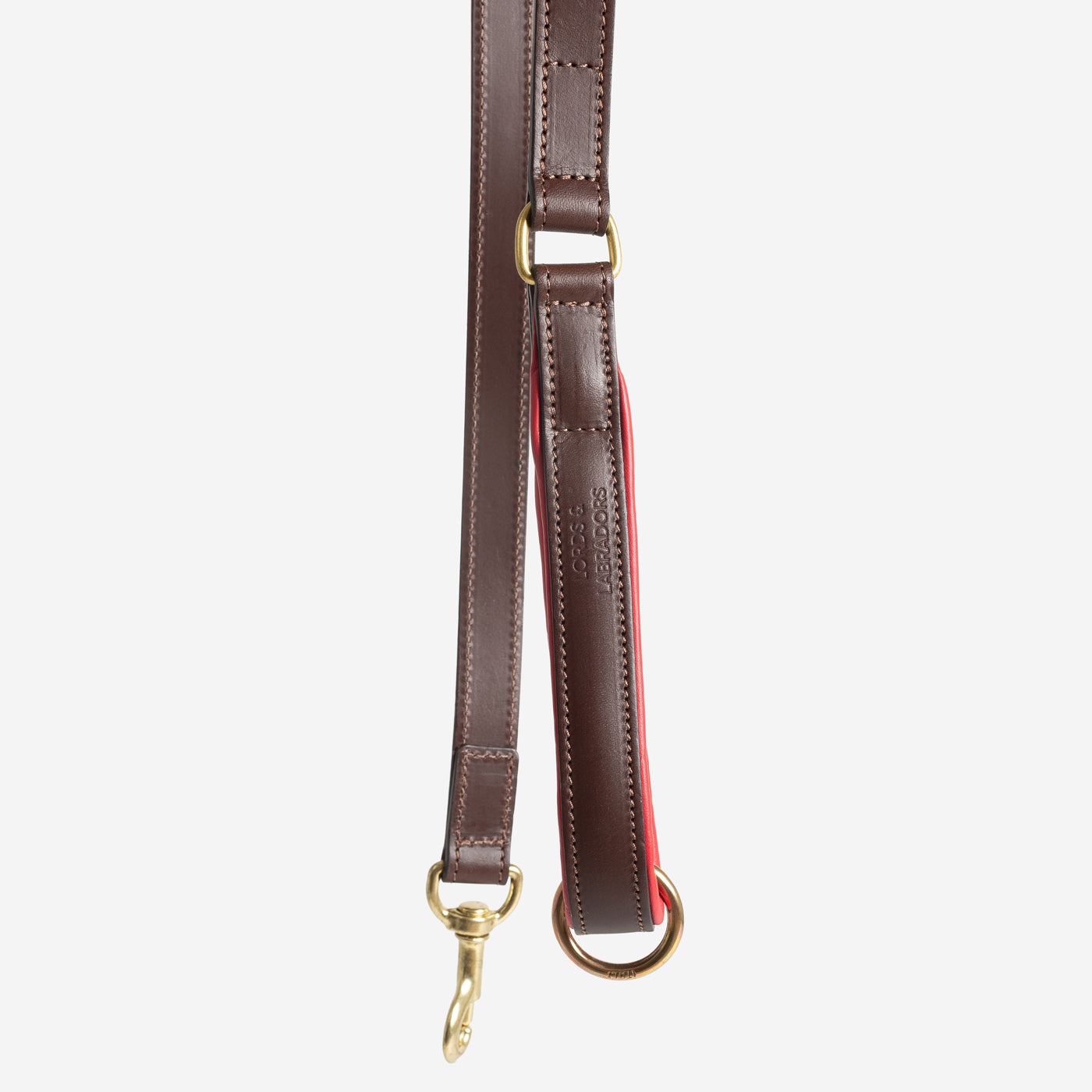 Discover dog walking luxury with our handcrafted Italian padded leather dog Lead in Brown & Red! The perfect Lead for dogs available now at Lords & Labradors    