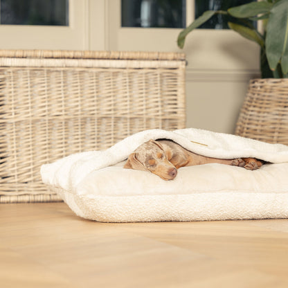 Luxury Ivory Boucle Sleepy Burrow, The Perfect bed For a Pet to Burrow. Available To Personalise In Stunning Ivory Bouclé Here at Lords & Labradors