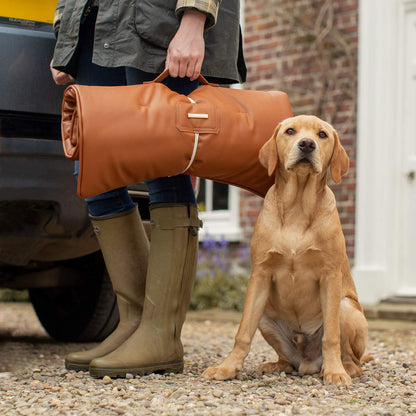 Embark on the perfect pet travel with our luxury Travel Mat in Essentials Rhino Ember. Featuring a Carry handle for on the move once Rolled up for easy storage, can be used as a seat cover, boot mat or travel bed! Available now at Lords & Labradors