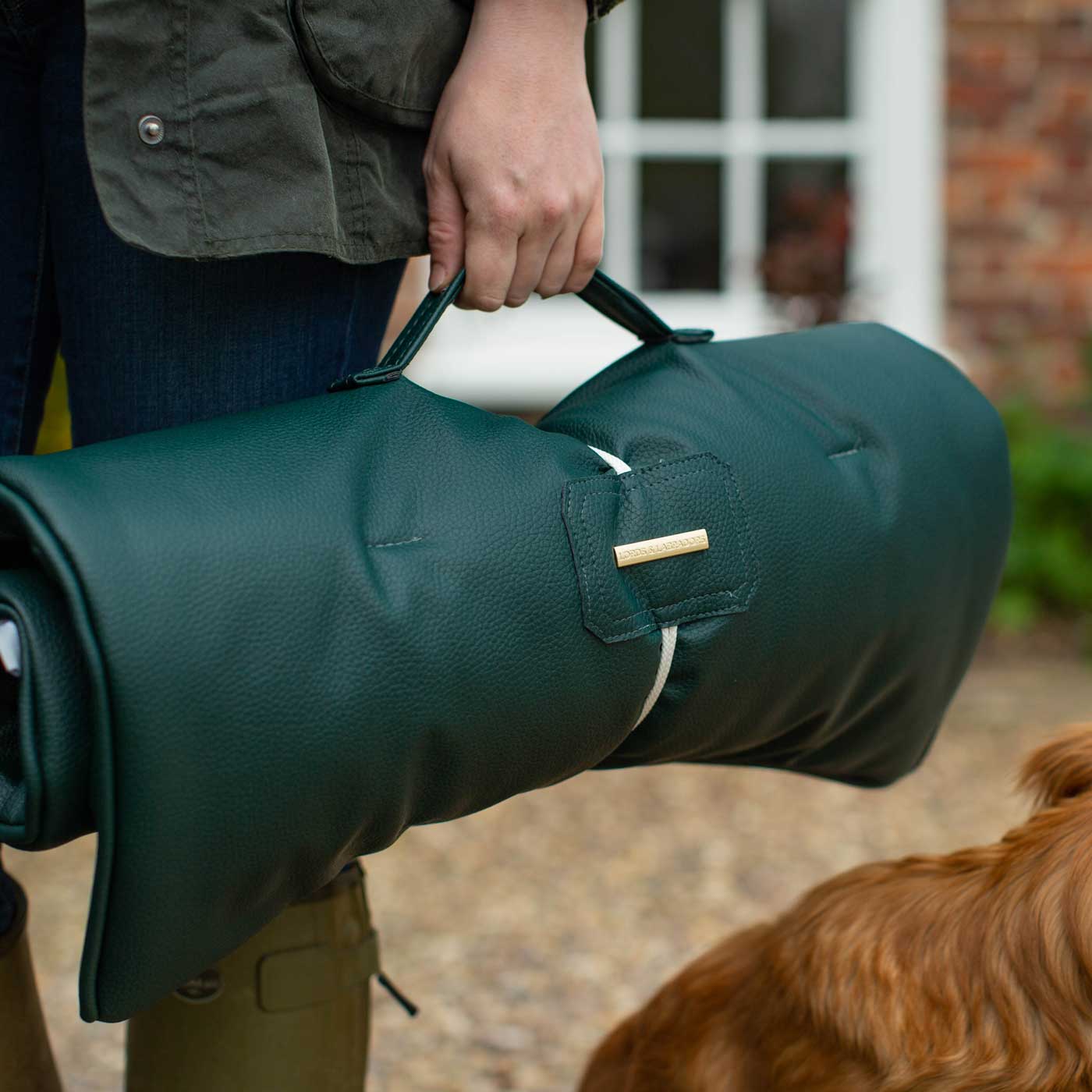 Embark on the perfect pet travel with our luxury Travel Mat in Rhino Forest (Green). Featuring a Carry handle for on the move once Rolled up for easy storage, can be used as a seat cover, boot mat or travel bed! Available now at Lords & Labradors 