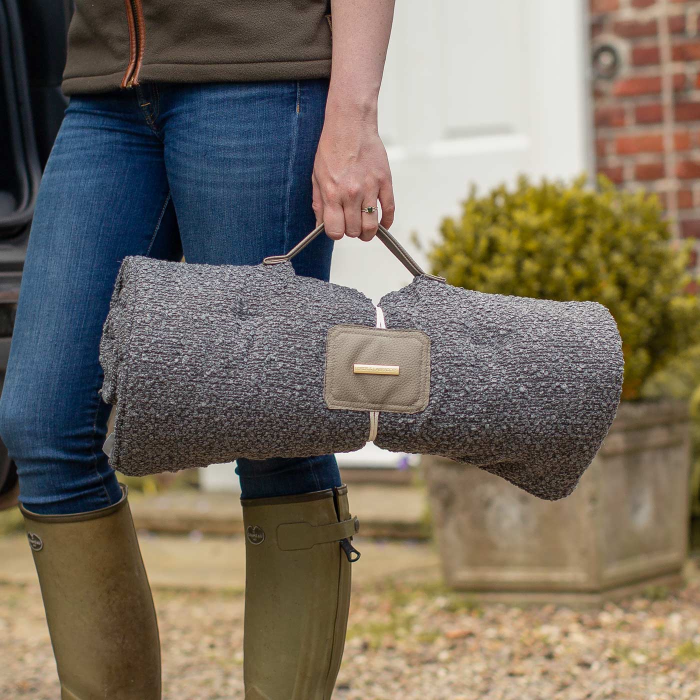 Embark on the perfect pet travel with our luxury Travel Mat in Granite Boucle. Featuring a Carry handle for on the move once Rolled up for easy storage, can be used as a seat cover, boot mat or travel bed! Available now at Lords & Labradors