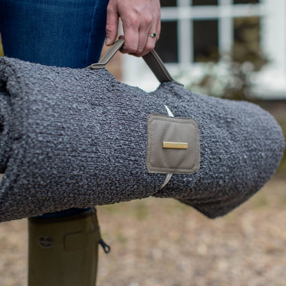 Embark on the perfect pet travel with our luxury Travel Mat in Granite Boucle. Featuring a Carry handle for on the move once Rolled up for easy storage, can be used as a seat cover, boot mat or travel bed! Available now at Lords & Labradors