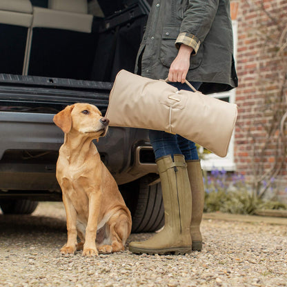 Embark on the perfect pet travel with our luxury Travel Mat in Rhino Sand. Featuring a Carry handle for on the move once Rolled up for easy storage, can be used as a seat cover, boot mat or travel bed! Available now at Lords & Labradors