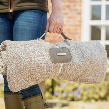 Embark on the perfect pet travel with our luxury Travel Mat in Mink Boucle. Featuring a Carry handle for on the move once Rolled up for easy storage, can be used as a seat cover, boot mat or travel bed! Available now at Lords & Labradors