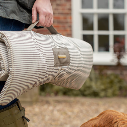 Embark on the perfect pet travel with our luxury Travel Mat in Regency Stripe. Featuring a Carry handle for on the move once Rolled up for easy storage, can be used as a seat cover, boot mat or travel bed! Available now at Lords & Labradors