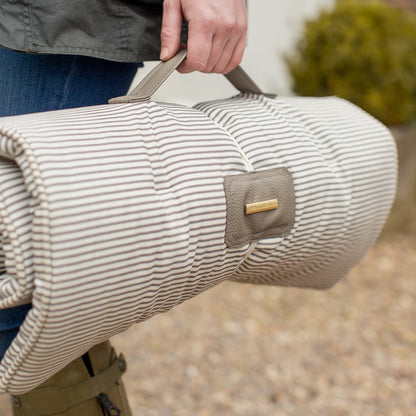 Embark on the perfect pet travel with our luxury Travel Mat in Regency Stripe. Featuring a Carry handle for on the move once Rolled up for easy storage, can be used as a seat cover, boot mat or travel bed! Available now at Lords & Labradors