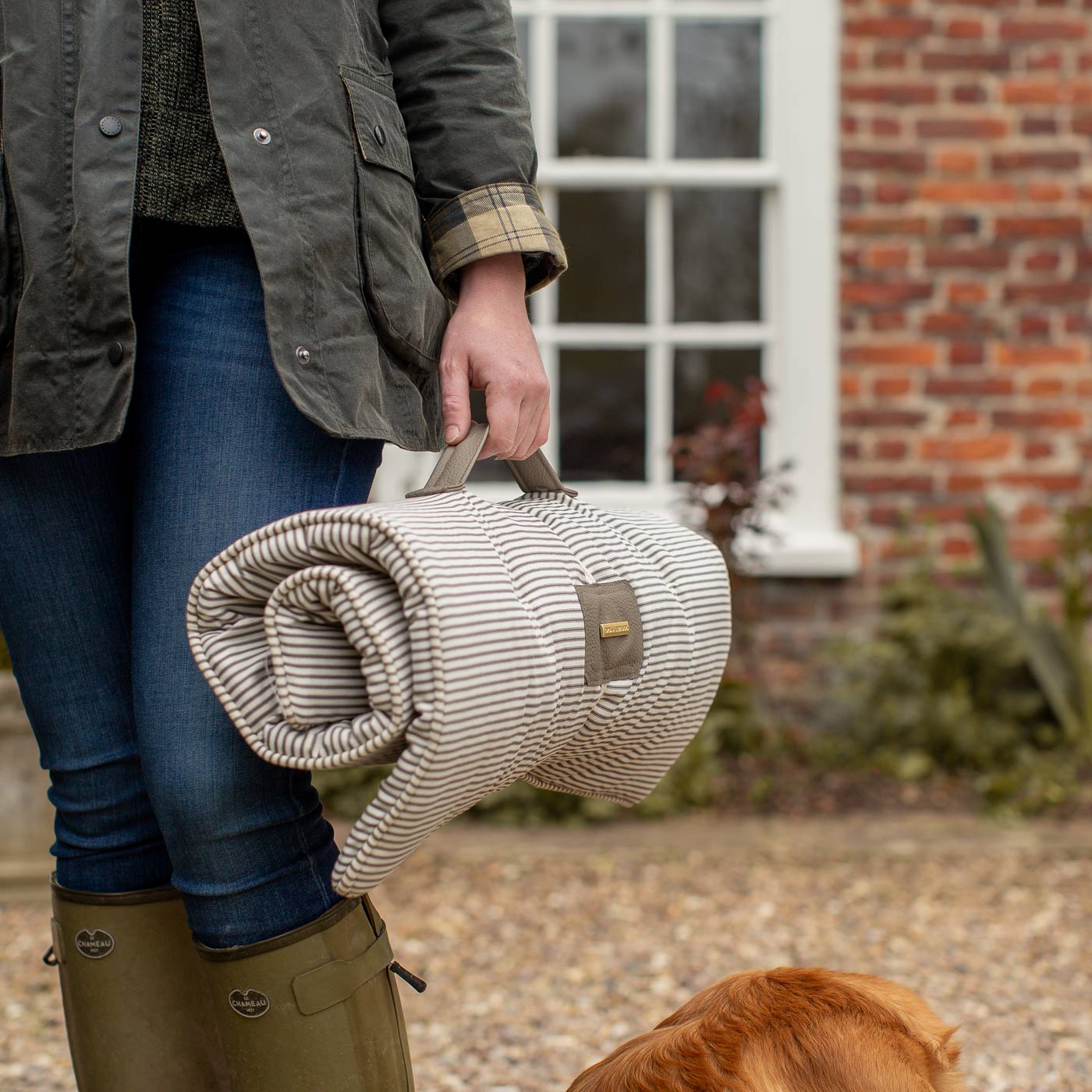 Embark on the perfect pet travel with our luxury Travel Mat in Regency Stripe. Featuring a Carry handle for on the move once Rolled up for easy storage, can be used as a seat cover, boot mat or travel bed! Available now at Lords & Labradors