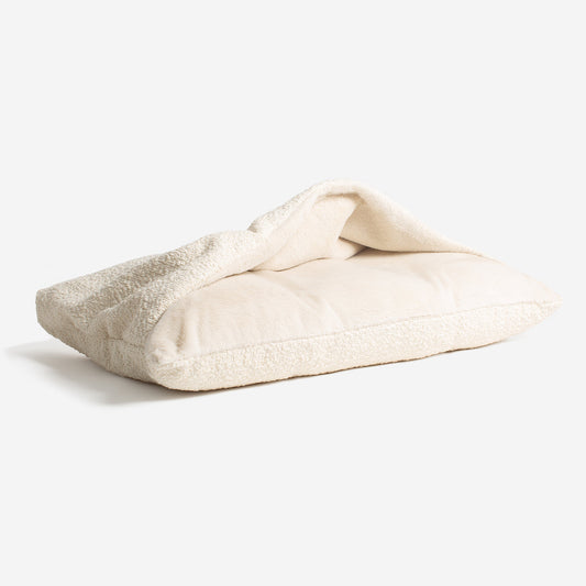 Luxury Ivory Boucle Sleepy Burrow, The Perfect bed For a Pet to Burrow. Available To Personalise In Stunning Ivory Bouclé Here at Lords & Labradors