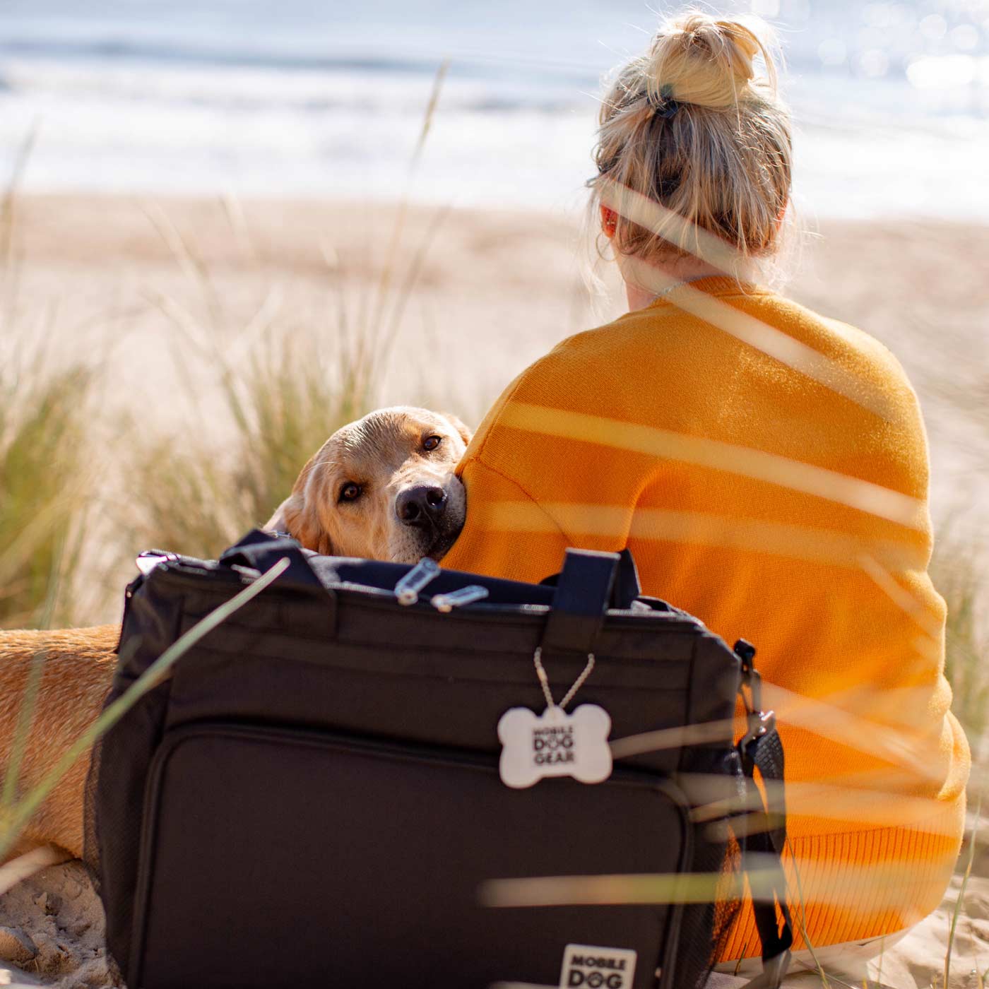 Discover, Mobile Dog Gear Week Away Bag, in Black. The Perfect Away Bag for any Pet Parent, Featuring dividers to stack food and built in waste bag dispenser. Also Included feeding set, collapsible silicone bowls and placemat! The Perfect Gift For travel, meets airline requirements. Available Now at Lords & Labradors