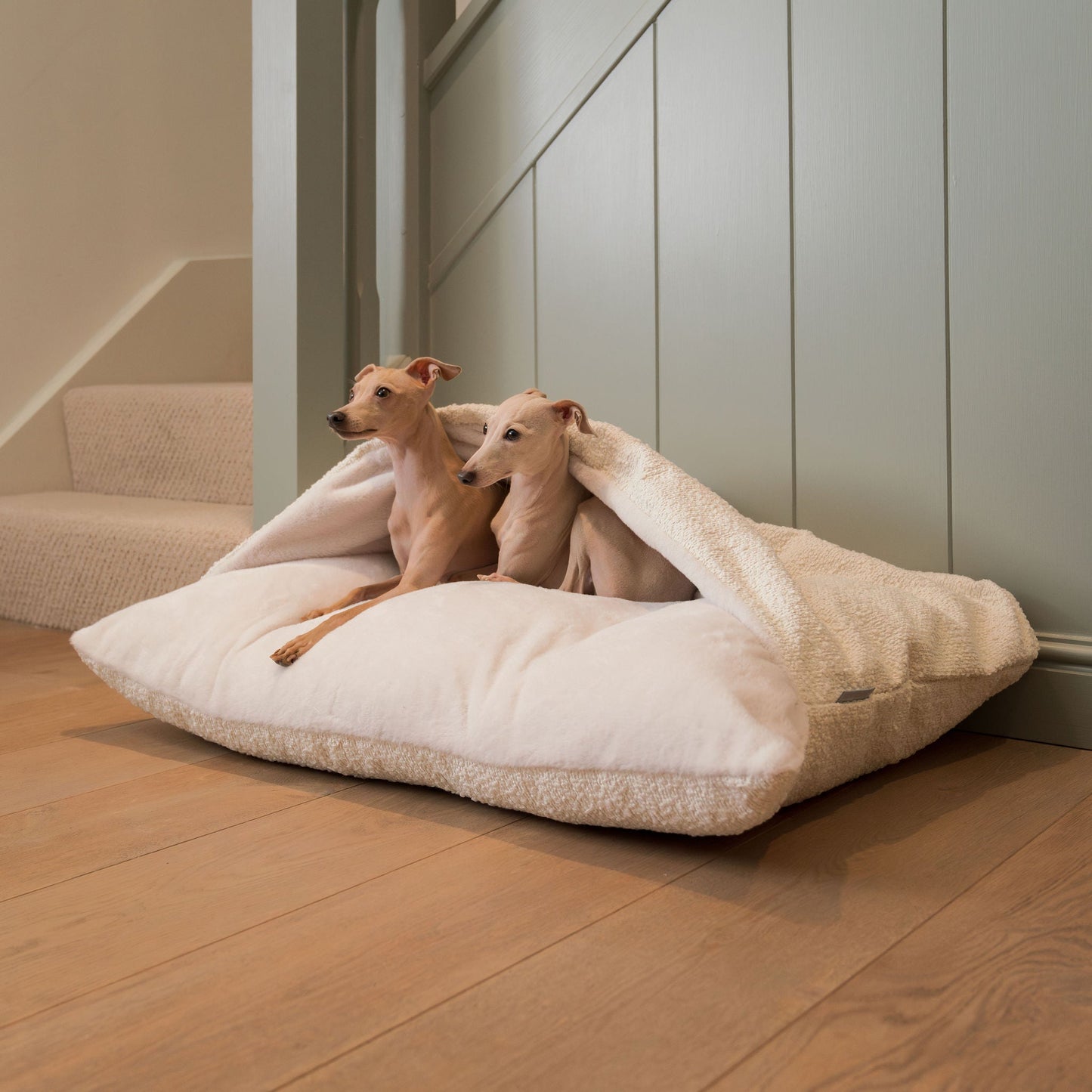 Luxury Ivory Boucle Sleepy Burrow, The Perfect bed For a Pet to Burrow. Available To Personalise In Stunning Ivory Bouclé Here at Lords & Labradors