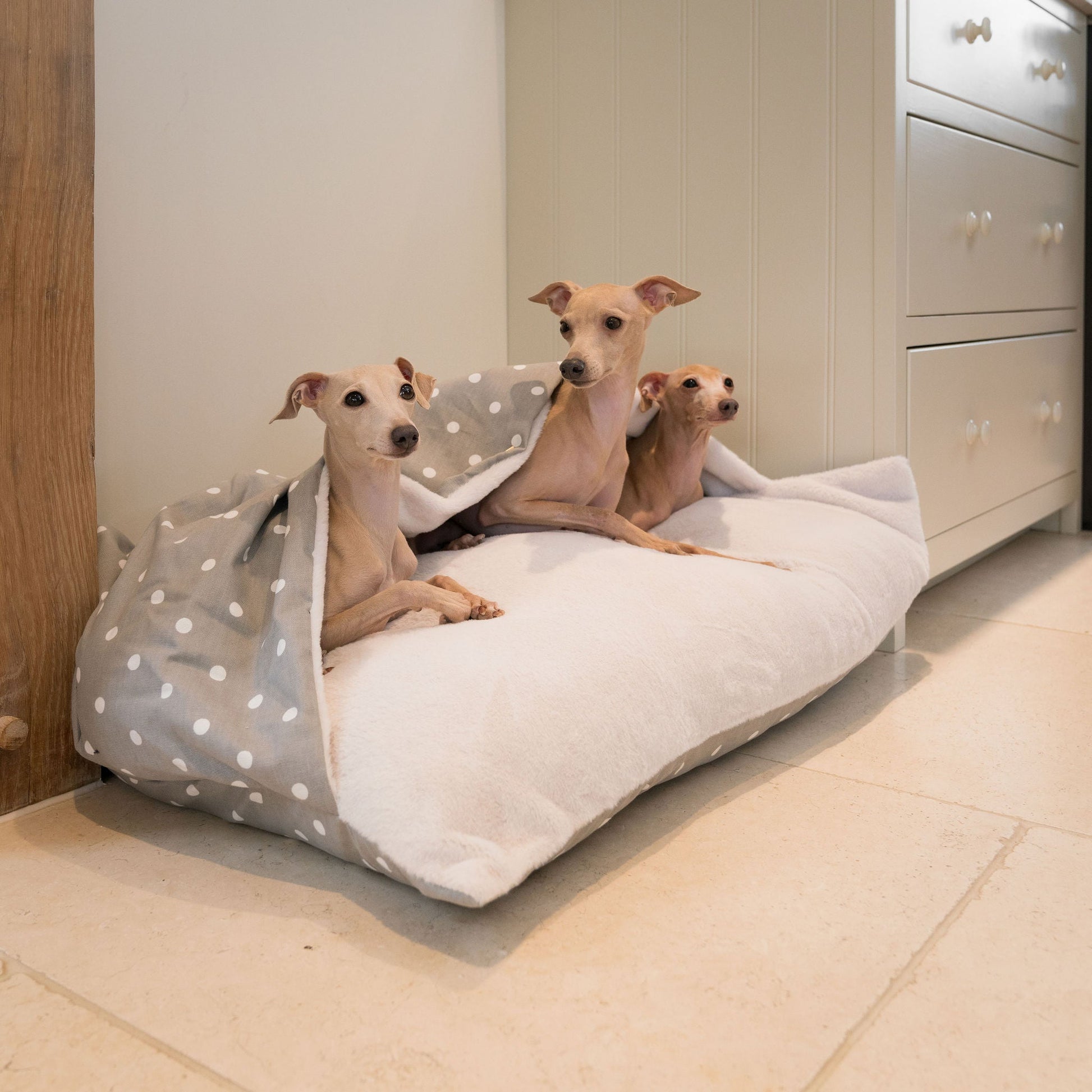 Discover The Perfect Burrow For Your Pet, Our Stunning Sleepy Burrow Dog Beds In Grey Spot, Is The Perfect Bed Choice For Your Pet, Available Now at Lords & Labradors 