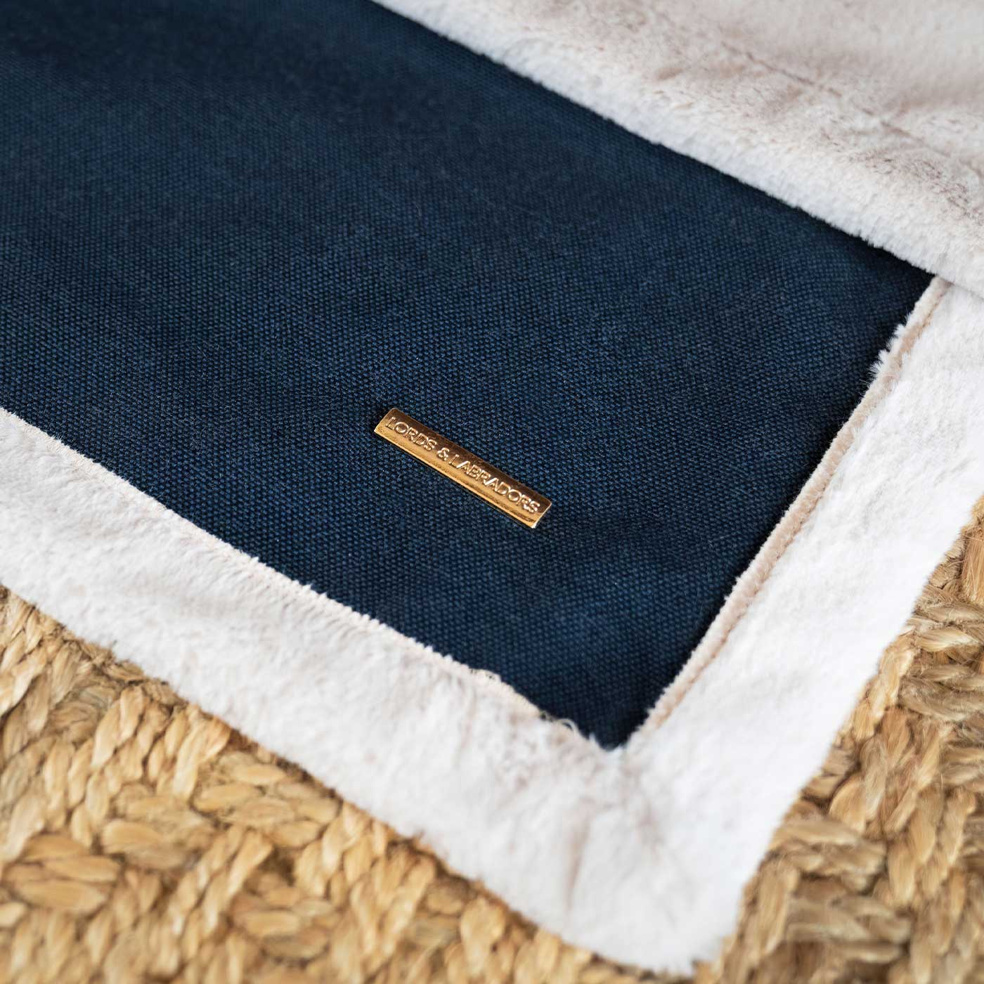 Present your furry friend with our luxuriously thick, plush blanket for your pet. Featuring a reverse side with hardwearing woven fabric handmade in Italy for the perfect high-quality pet blanket! Essentials Twill Blanket In Denim, Available now at Lords & Labradors    