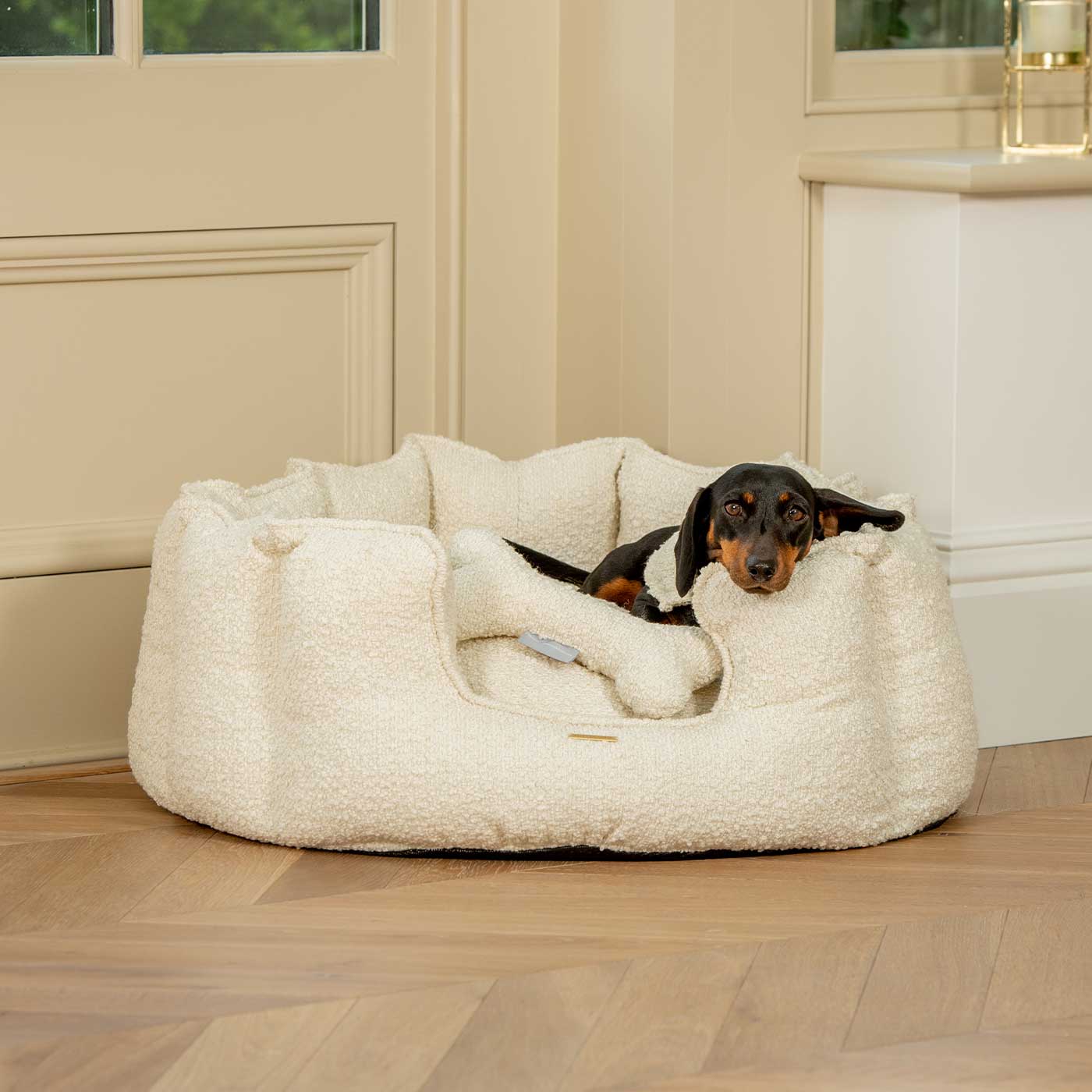 Discover Our Luxurious High Wall Bed For Dogs, Featuring inner pillow with plush teddy fleece on one side To Craft The Perfect Dogs Bed In Stunning Ivory Bouclé! Available To Personalise Now at Lords & Labradors    