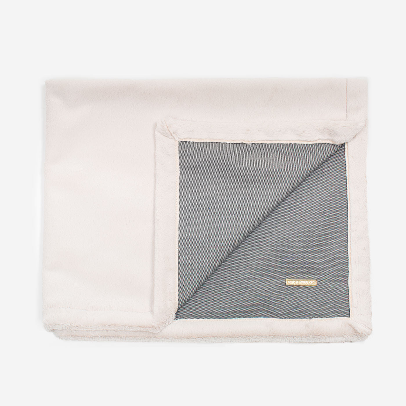 Present your furry friend with our luxuriously thick, plush blanket for your pet. Featuring a reverse side with hardwearing woven fabric handmade in Italy for the perfect high-quality pet blanket! Essentials Twill Blanket In Slate, Available now at Lords & Labradors    