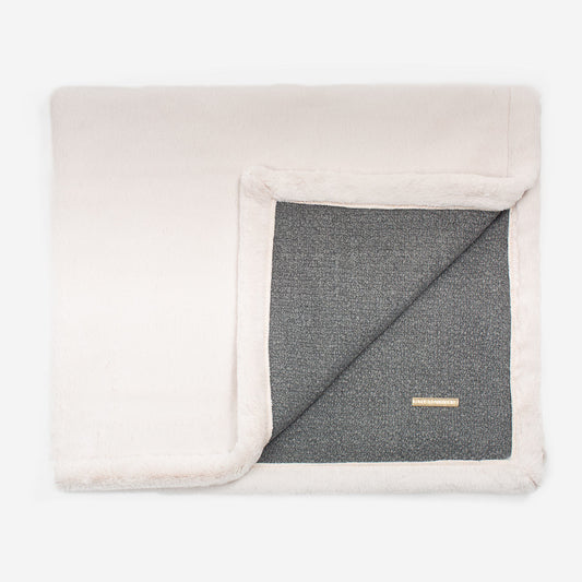 Present your furry friend with our luxuriously thick, plush blanket for your pet. Featuring a reverse side with hardwearing woven fabric handmade in Italy for the perfect high-quality pet blanket! Essentials Herdwick Blanket In Graphite, Available now at Lords & Labradors    