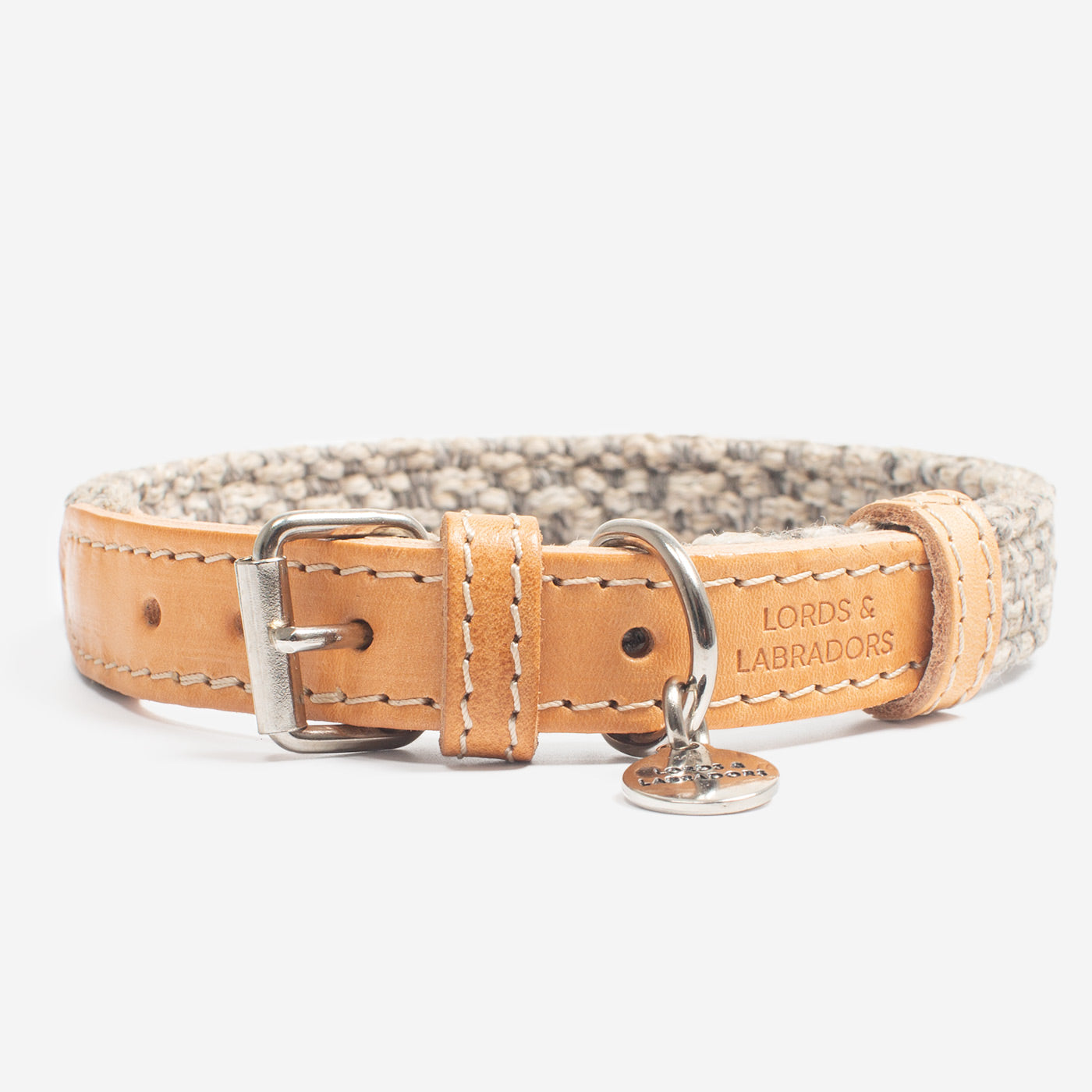 Discover dog walking luxury with our handcrafted Italian dog collar in beautiful pebble with woven grey fabric! The perfect collar for dogs available now at Lords & Labradors 