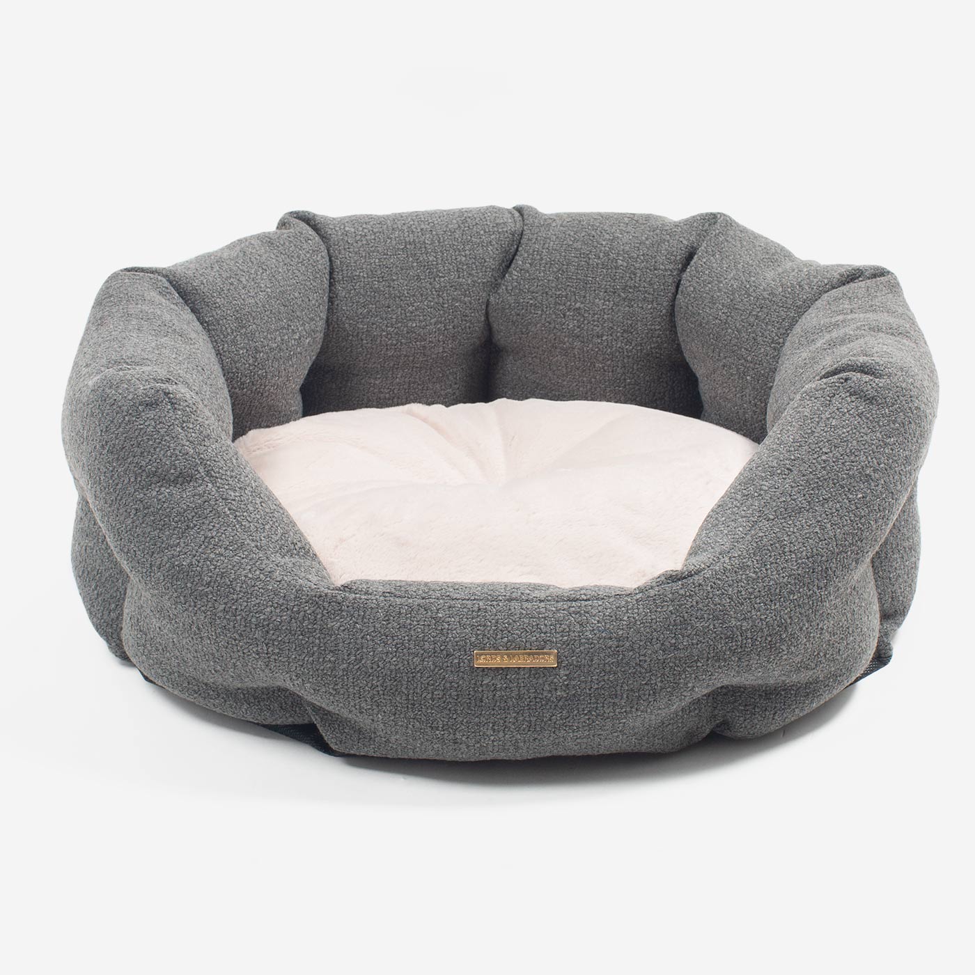 Discover our luxury Herdwick oval dog bed in beautiful graphite, the ideal choice for dogs to enjoy blissful nap-time, featuring reversible inner cushion with raised sides for dogs who love to rest their head for the ultimate cosiness! Handcrafted in Italy for pure pet luxury! Available now at Lords & Labradors    