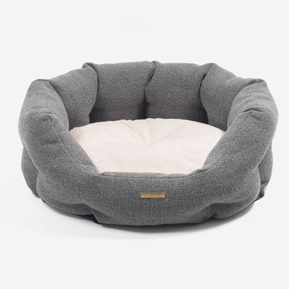 Discover our luxury Herdwick oval dog bed in beautiful graphite, the ideal choice for dogs to enjoy blissful nap-time, featuring reversible inner cushion with raised sides for dogs who love to rest their head for the ultimate cosiness! Handcrafted in Italy for pure pet luxury! Available now at Lords & Labradors    