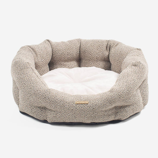 Discover our luxury Herdwick oval dog bed in beautiful pebble, the ideal choice for dogs to enjoy blissful nap-time, featuring reversible inner cushion with raised sides for dogs who love to rest their head for the ultimate cosiness! Handcrafted in Italy for pure pet luxury! Available now at Lords & Labradors 