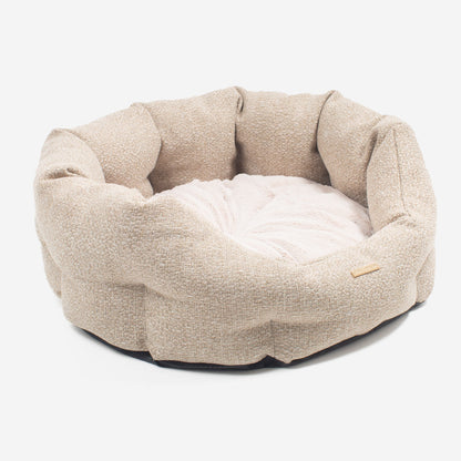 Discover our luxury Herdwick oval dog bed in beautiful sandstone, the ideal choice for dogs to enjoy blissful nap-time, featuring reversible inner cushion with raised sides for dogs who love to rest their head for the ultimate cosiness! Handcrafted in Italy for pure pet luxury! Available now at Lords & Labradors    