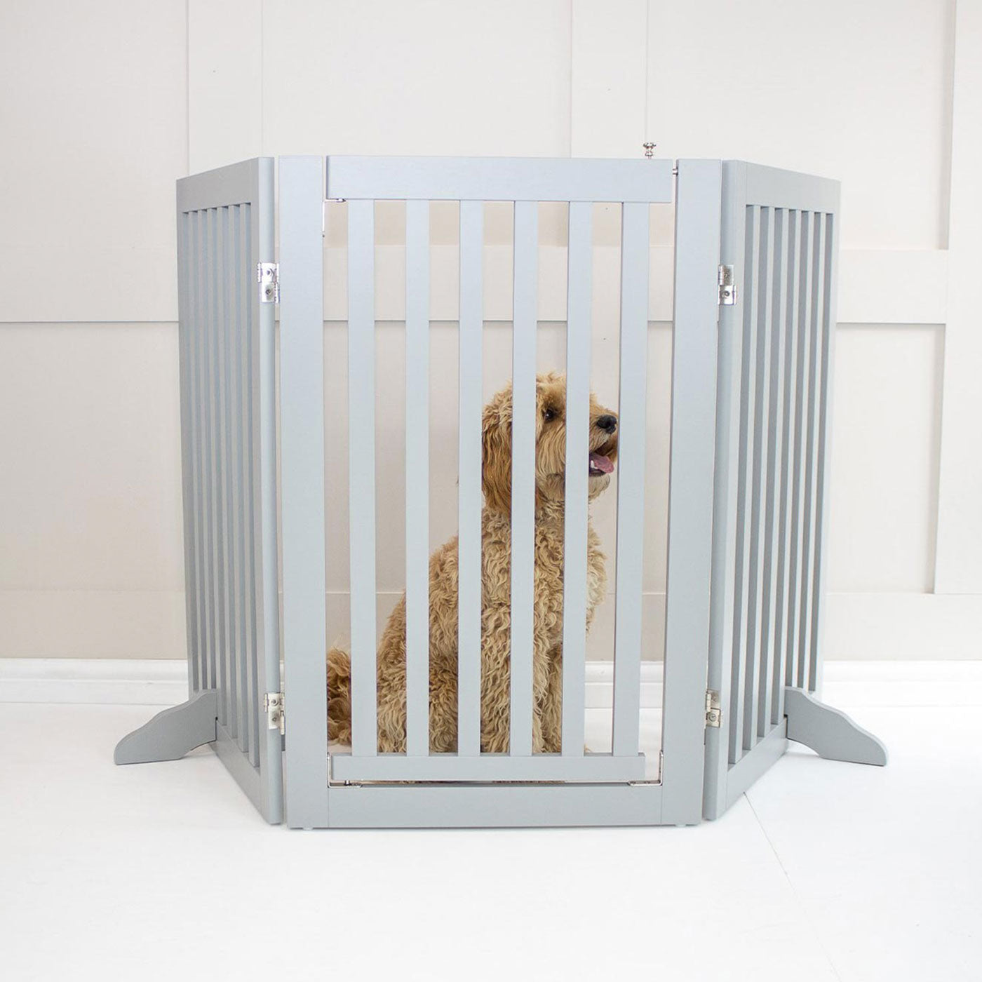 Train your new puppy with the perfect pet furniture, our super-strong wooden dog gate will ensure you set the boundaries for your furry friend, made easy to assemble featuring a walk-through gate for easy accessibility to be installed in doorways, hallways and stairs! Shop the ideal pet gate, available now in white & grey at Lords & Labradors     