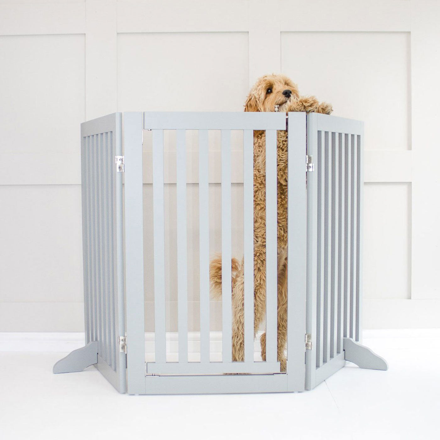 Train your new puppy with the perfect pet furniture, our super-strong wooden dog gate will ensure you set the boundaries for your furry friend, made easy to assemble featuring a walk-through gate for easy accessibility to be installed in doorways, hallways and stairs! Shop the ideal pet gate, available now in white & grey at Lords & Labradors     